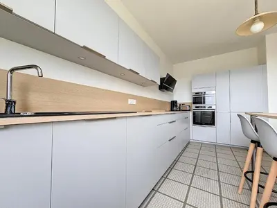 Cuisine ou kitchenette dans l'établissement Minven