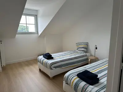 Un ou plusieurs lits dans un hébergement de l'établissement Le duplex Saint-Corentin - Hyper Centre - Parking Privé