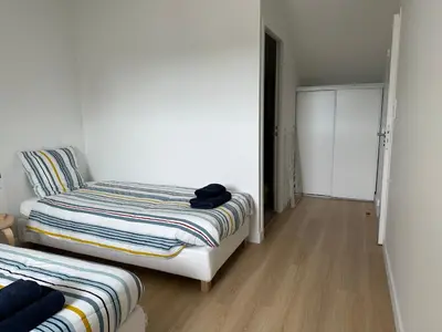 Un ou plusieurs lits dans un hébergement de l'établissement Le duplex Saint-Corentin - Hyper Centre - Parking Privé