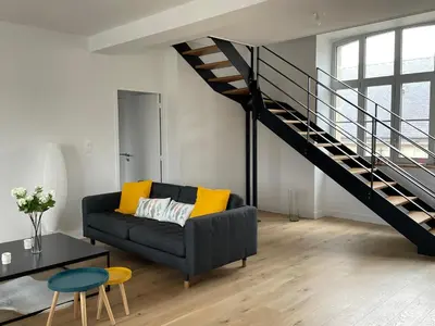 Coin salon dans l'établissement Le duplex Saint-Corentin - Hyper Centre - Parking Privé