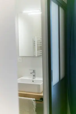 Salle de bains dans l'établissement Mc Guigan's appart hôtel appartement