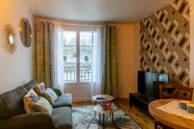 Coin salon dans l'établissement Mc Guigan's appart hôtel appartement