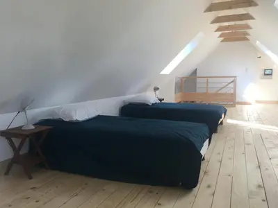 Un ou plusieurs lits dans un hébergement de l'établissement La maison de Gwen