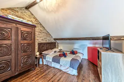 Un ou plusieurs lits dans un hébergement de l'établissement KerMad - Maison avec jardin