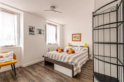 Un ou plusieurs lits dans un hébergement de l'établissement KerMad - Maison avec jardin