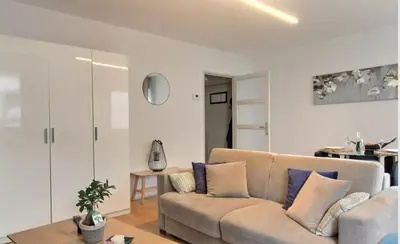 Coin salon dans l'établissement Appartement hyper centre avec garage privé
