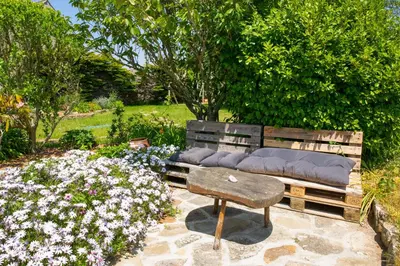 Jardin de l'établissement Grande maison familiale pour 8 avec jardin