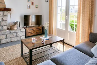 Coin salon dans l'établissement Grande maison familiale pour 8 avec jardin