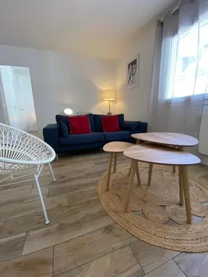 Coin salon dans l'établissement COSY CONFORT LA PEROUSE 1A coeur de ville et plage