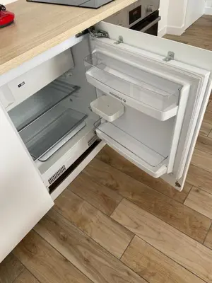 Cuisine ou kitchenette dans l'établissement COSY CONFORT LA PEROUSE 1A coeur de ville et plage