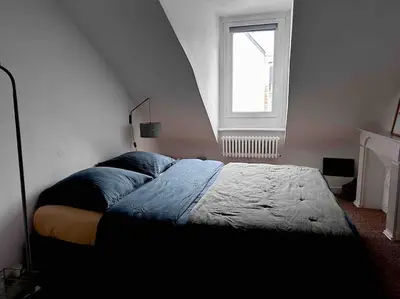 Un ou plusieurs lits dans un hébergement de l'établissement L'Odet - Superbe vue sur les quais - Hyper Centre