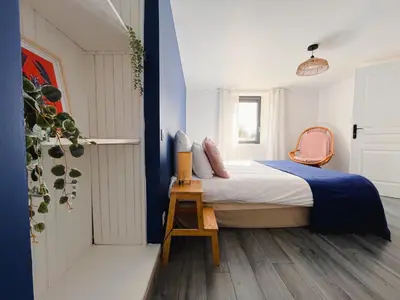 Un ou plusieurs lits dans un hébergement de l'établissement Gîte Familial 3 étoiles - Maison Kidour