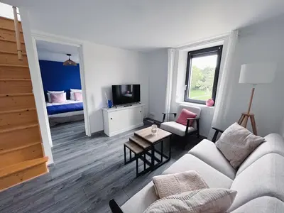 Télévision ou salle de divertissement dans l'établissement Gîte Familial 3 étoiles - Maison Kidour