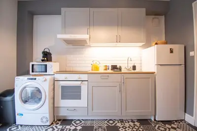 Cuisine ou kitchenette dans l'établissement Wood & Sea I Sauna & Hyper centre