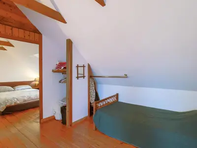 Un ou plusieurs lits dans un hébergement de l'établissement Holiday Home Le Petit Poirier by Interhome