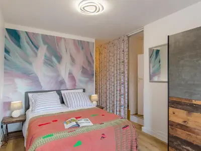 Un ou plusieurs lits dans un hébergement de l'établissement Holiday Home Belvédère sur la Mer by Interhome