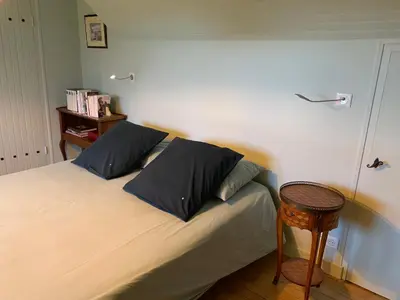 Un ou plusieurs lits dans un hébergement de l'établissement Cottage Tea Mamm , écrin de verdure et son jardin de thé, 3 étoiles