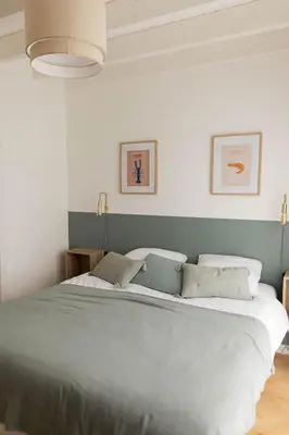 Un ou plusieurs lits dans un hébergement de l'établissement Men Louet E - Gîte de bord de mer