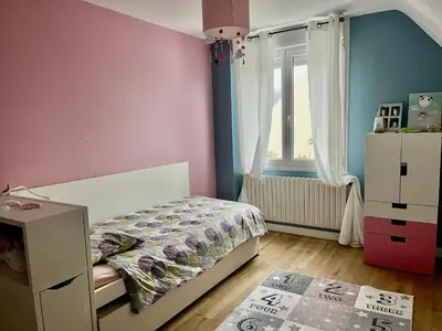 Un ou plusieurs lits dans un hébergement de l'établissement Maison au calme à Dirinon