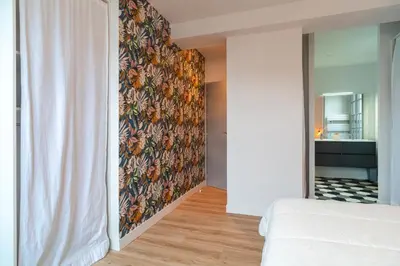 Un ou plusieurs lits dans un hébergement de l'établissement La Mouette - Appartement à 100m de la plage