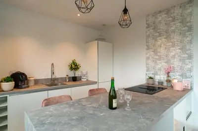 Cuisine ou kitchenette dans l'établissement La Mouette - Appartement à 100m de la plage