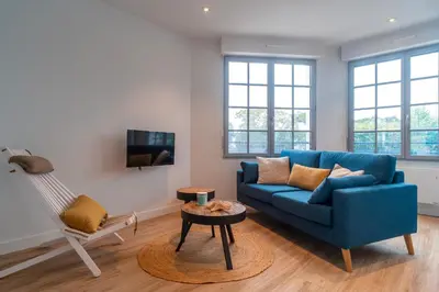 Coin salon dans l'établissement La Mouette - Appartement à 100m de la plage