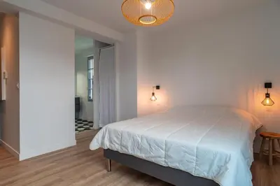 Un ou plusieurs lits dans un hébergement de l'établissement La Mouette - Appartement à 100m de la plage