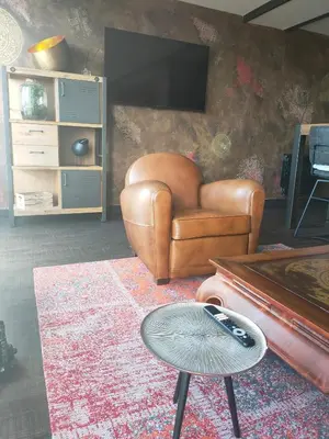 Télévision ou salle de divertissement dans l'établissement This one