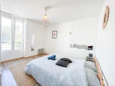 Un ou plusieurs lits dans un hébergement de l'établissement Superbe appartement T3 cosy de 60m2