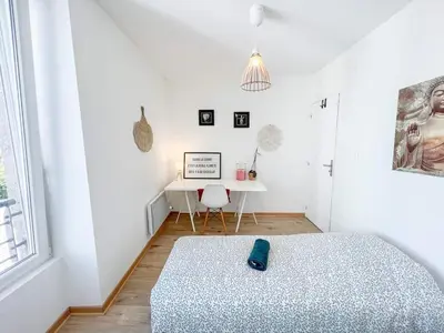 Un ou plusieurs lits dans un hébergement de l'établissement Superbe appartement T3 cosy de 60m2
