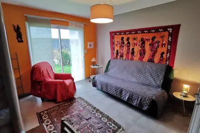 Coin salon dans l'établissement Maison Kermajo