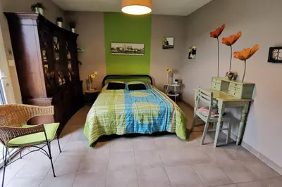 Un ou plusieurs lits dans un hébergement de l'établissement Maison Kermajo