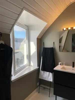 Un ou plusieurs lits dans un hébergement de l'établissement La Part des Anges 29 - Maison d'hôtes et Table épicurienne