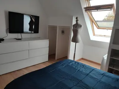 Un ou plusieurs lits dans un hébergement de l'établissement Maison entre terre et mer avec SPA privatif