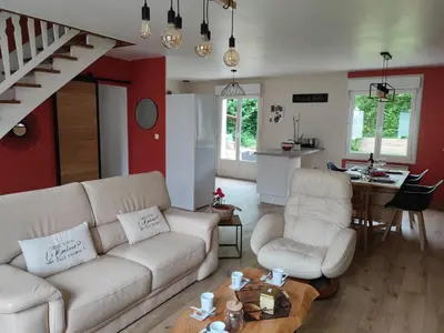 Coin salon dans l'établissement Maison entre terre et mer avec SPA privatif