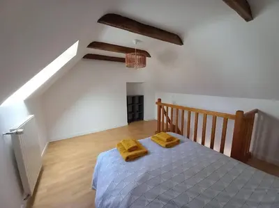 Un ou plusieurs lits dans un hébergement de l'établissement Aven, maisonnette avec mezzanine