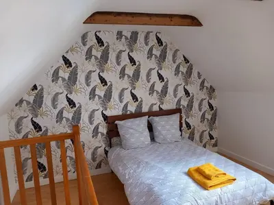 Un ou plusieurs lits dans un hébergement de l'établissement Aven, maisonnette avec mezzanine