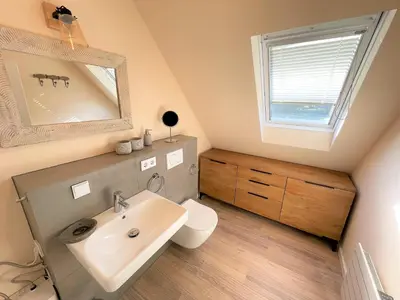 Salle de bains dans l'établissement Helles Ferienhaus mit wunderschönem Meerblick