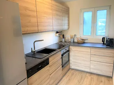 Cuisine ou kitchenette dans l'établissement Helles Ferienhaus mit wunderschönem Meerblick