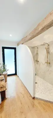 Un ou plusieurs lits dans un hébergement de l'établissement Le Clos de Squividan