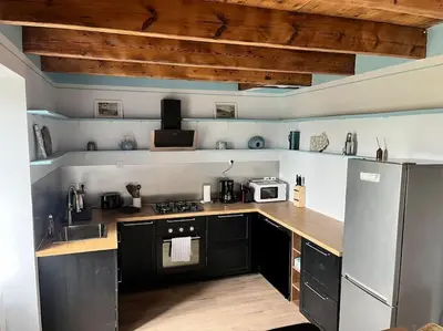 Cuisine ou kitchenette dans l'établissement La maison sur le rivage, vue mer centre village