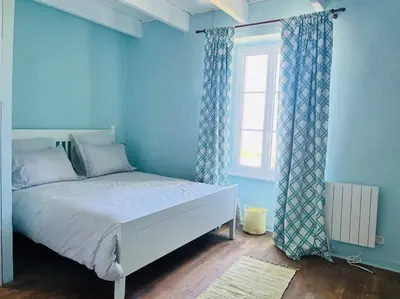 Un ou plusieurs lits dans un hébergement de l'établissement La maison sur le rivage, vue mer centre village