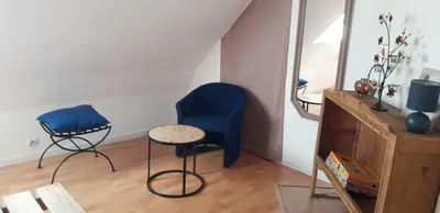 Coin salon dans l'établissement Chambre d'hôtes de la voie bleue.