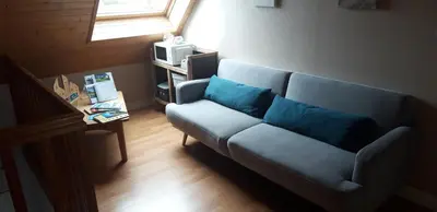 Coin salon dans l'établissement Chambre d'hôtes de la voie bleue.