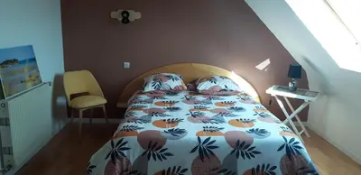 Un ou plusieurs lits dans un hébergement de l'établissement Chambre d'hôtes de la voie bleue.