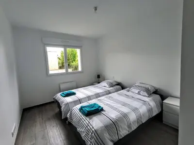 Un ou plusieurs lits dans un hébergement de l'établissement Villa à 900m des plages