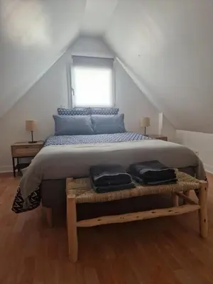 Un ou plusieurs lits dans un hébergement de l'établissement Le Cottage
