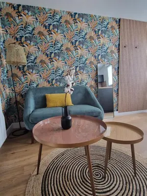 Coin salon dans l'établissement Le Cottage