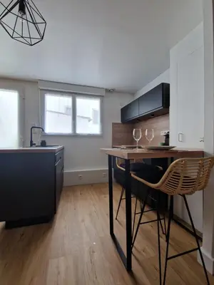 Cuisine ou kitchenette dans l'établissement Le Cottage