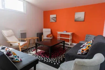 Coin salon dans l'établissement Gite de la Baie - Morgat